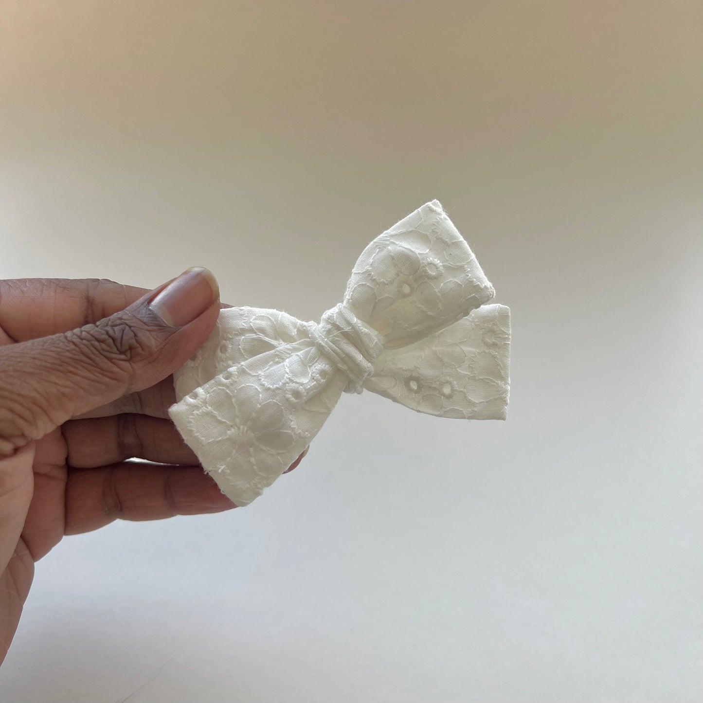 white eyelet | baby bow