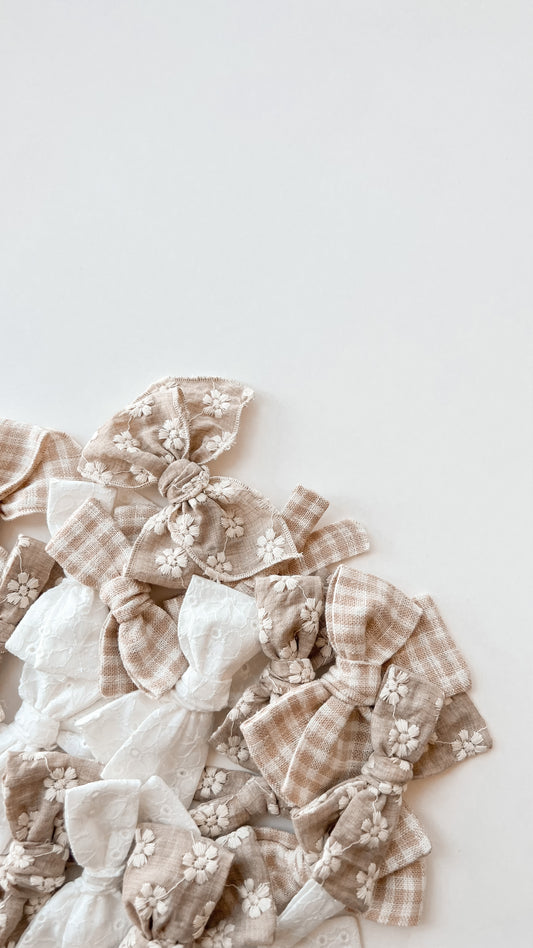 white eyelet | baby bow